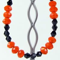 Bright Orange and Black Faceted Glass Bracelet